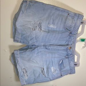 Light blue Jean mid shorts distressed
